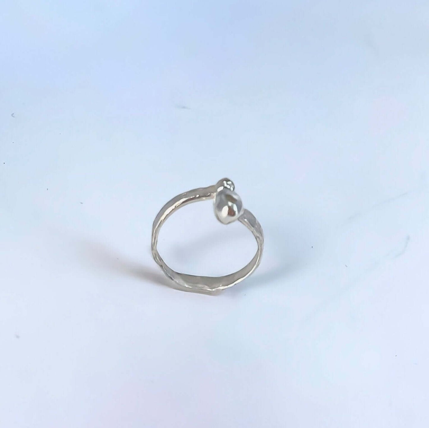 Radiant Loop Ring with modern and elegant design, perfect for adding a touch of brilliance and sophistication to any outfit