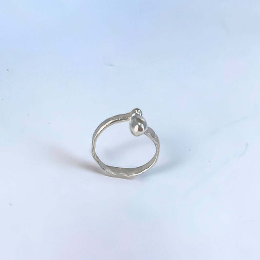 Radiant Loop Ring with modern and elegant design, perfect for adding a touch of brilliance and sophistication to any outfit